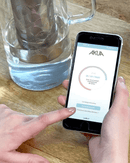 Carafe filtrante AKUA Cookut en verre avec filtration au charbon de coco pour eau pure et sans plastique.
