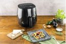 Friteuse Air Fryer 4L Zwilling avec légumes sains cuisinés, idéale pour un repas rapide et sans huile.